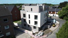 Seitenansicht Leben in K�nigshardt: Erdgeschosswohnung mit eigenem Garten